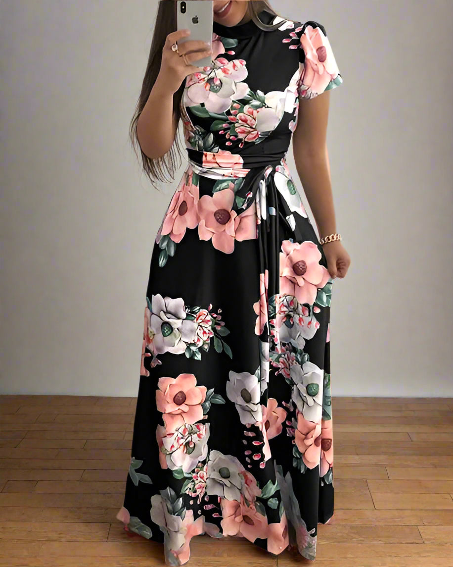 Product Features: Stylish boho-inspired maxi dress with large swing design Soft, flowy fabric with a slight stretch for all-day wear Belted waist sash for a flattering, feminine fit Floral digital print adds a fresh summer vibe Easy pullover style – no zips or buttons Perfect for holidays, summer events, or weekend getaways Lightweight and breathable – ideal for warm weather Available in multiple sizes to suit all body types Elegant Floral Lace-Up Boho Maxi Dress – Summer Swing Style with Belted Waist Step into summer with this Floral Lace-Up Boho Maxi Dress, crafted in a dreamy pastel palette and covered in elegant floral prints. The sash belt adds a cinched charm to the flowy A-line silhouette, while the soft stretch fabric ensures you stay comfortable all day. Whether you're heading to a brunch, beach outing, or casual garden party, this dress brings effortless beauty and style wherever you go. Specifications: Material: Polyester, Spandex Neckline: O-Neck Sleeve Length: Short (4–16 inches) Closure Type: Pullover Waistline: Natural with lace-up sash Dress Length: Ankle-Length Fit Type: Loose Pattern: Digital Floral Print Silhouette: A-Line Style: Bohemian / Casual Chic Elasticity: Slight Stretch